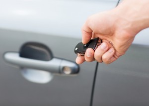 5872660-man-with-car-key-outside